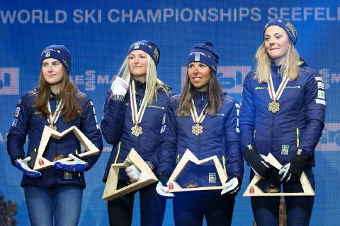 Nordische Ski WM in Seefeld, 4x5km Staffel Damen, Siegerehrung NORDIC SKIING - FIS Nordic World Ski Championships Seefeld 2019 SEEFELD,AUSTRIA,28.FEB.19 - NORDIC SKIING, CROSS COUNTRY SKIING - FIS Nordic World Ski Championships, Medal Plaza, award ceremony, 4x5km relay, ladies. Image shows Ebba Andersson, Frida Karlsson, Charlotte Kalla, Stina Nilsson (SWE). GEPAxpictures xCh.xKelemen