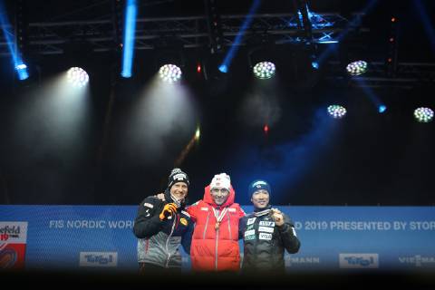 Nordische Ski WM in Seefeld, Nordische Kombination, Siegerehrung NORDIC SKIING - FIS Nordic World Ski Championships Seefeld 2019 SEEFELD,AUSTRIA,28.FEB.19 - NORDIC SKIING, CROSS COUNTRY SKIING - FIS Nordic World Ski Championships, Medal Plaza, award ceremony, 4x5km relay, ladies. Image shows Bernhard Gruber (AUT), Jarl Magnus Riiber (NOR) and Akito Watabe (JPN). Keywords: medal. GEPAxpictures xChristianxWalgram
