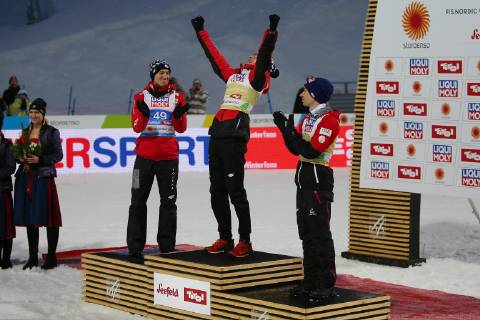 NORDIC SKIING - FIS Nordic World Ski Championships Seefeld 2019 SEEFELD,AUSTRIA,01.MAR.19 - NORDIC SKIING, Ski jumping Skispringen Ski nordisch - FIS Nordic World Ski Championships, normal hill, flower ceremony. Image shows Kamil Stoch (POL), Dawid Kubacki (POL) and Stefan Kraft (AUT). GEPAxpictures xThomasxBachun