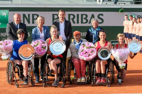 (R-L) Sabine Ellerbrook of Germany, Marjolein Buis, Diede De Groot and Annie Van Koot of the Netherlands pose with the trophies during the trophy ceremony of the French Open wheelchair and quad wheelchair tennis tournament at the Roland Garros in Paris, France on June 8, 2019.  (105399031)
