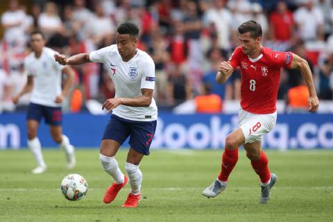 Switzerland v England UEFA Nations League 3rd Place Play-off Jesse Lingard of England and Remo Freuler of Switzerland in action during the UEFA Nations League 3rd Place Play-off match at Estadio D. Afonso Henrique, Guimaraes Content Not Available For UK Newspapers Copyright: xPaulxChestertonx FIL-13338-0029