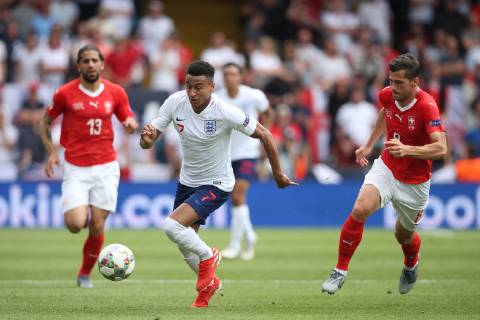 Switzerland v England UEFA Nations League 3rd Place Play-off Jesse Lingard of England and Remo Freuler of Switzerland in action during the UEFA Nations League 3rd Place Play-off match at Estadio D. Afonso Henrique, Guimaraes Content Not Available For UK Newspapers Copyright: xPaulxChestertonx FIL-13338-0031