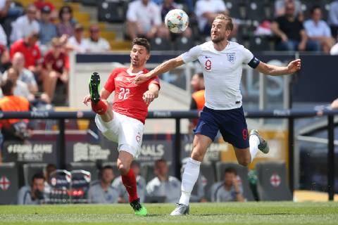 Switzerland v England UEFA Nations League 3rd Place Play-off Fabian Schar of Switzerland and Harry Kane of England in action during the UEFA Nations League 3rd Place Play-off match at Estadio D. Afonso Henrique, Guimaraes Content Not Available For UK Newspapers Copyright: xPaulxChestertonx FIL-13338-0072