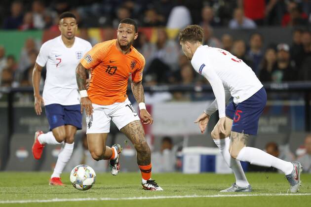 GUIMARAES, 06-06-2019, Estadio D. Afonso Henriques , UEFA Nations League Semi Final. Netherlands player Memphis Depay (C) and England player Jesse Lingard (L) and England player John Stones (R) during the game Netherlands - England 3-1. Netherlands - England x3634870x Copyright: