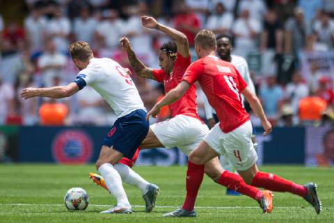 Guimaraes, Portugal, 09.06.2019, UEFA Nations League, 3. Platz, Schweiz - England, Harry Kane (England), Kevin Mbabu (Switzerland) and Nico Elvedi (Switzerland) battle for the ball ( Defodi-09-531-002561