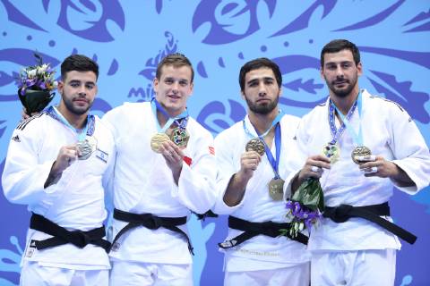 MINSK, BELARUS - JUNE 24, 2019: Athletes Li Kochman of Israel, Mikail Ozerler of Turkey, Khasan Khalmurzayev of Russia, and Mammadali Mekhdiyev (L-R) of Azerbaijan pose with their medals at a victory ceremony after their men s middleweight (-90kg) judo event at the 2nd Europaspiele Natalia Fedosenko TASS  TS0B0C38