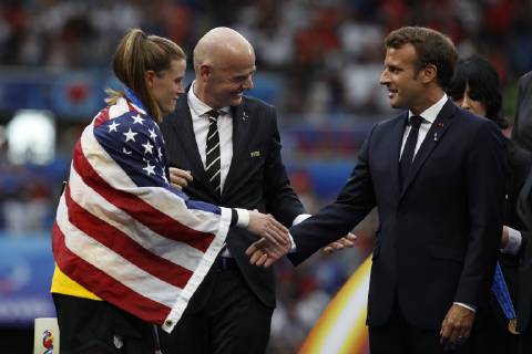 USA x Holland LYON, LY - 07.07.2019: USA X HOLLAND - Alyssa Naeher of the United States receives medal of FIFA President Gianni Infantino and the President of France Emmanuel Macron after the United States win the 2019 FIFA Women& 39;rld Cup Cup Final 2-0 against the Netherlands at the Lyon Stadium in Lyon , France. (Photo: RichCallis Fotoaotoarena) x1759477x  RichardxCallis