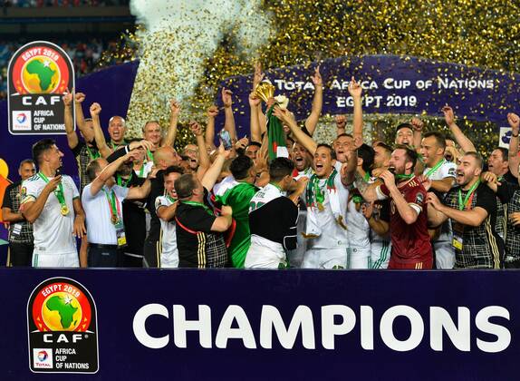 (190720) -- CAIRO, July 20, 2019 -- Team Algeria celebrate during the awarding ceremony after winning the 2019 Africa Cup of Nations final match between Senegal and Algeria in Cairo, Egypt on July 19, 2019. Algeria won 1-0 and claimed the title. ) (SP)EGYPT-CAIRO-SOCCER-AFRICA CUP OF NATIONS-FINAL-SENEGAL VS ALGERIA LixYan