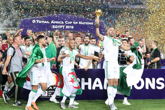 (190720) -- CAIRO, July 20, 2019 -- Team Algeria celebrate during the awarding ceremony after the 2019 Africa Cup of Nations final match between Senegal and Algeria in Cairo, Egypt on July 19, 2019. Algeria won 1-0 and claimed the title. ) (SP)EGYPT-CAIRO-SOCCER-AFRICA CUP OF NATIONS-FINAL-SENEGAL VS ALGERIA WangxTeng