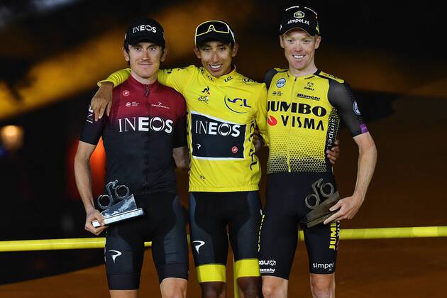 L-R, second, British Geraint Thomas of Team Ineos, winner Colombian Egan Bernal of Team Ineos wearing the yellow jersey and third Dutch Steven Kruijswijk of Team Jumbo-Visma celebrate on the podium of the general ranking after the final stage of the 106th edition of the Tour de France cycling race, from Rambouillet to Paris Champs-Elysees (128km), France, Sunday 28 July 2019. This year s Tour de France starts in Brussels and takes place from July 6th to July 28th. DAVIDxSTOCKMAN  x05635350x