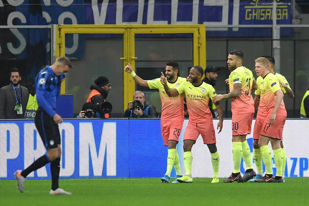 Raheem Sterling of Manchester City celebrates with team mates after scoring the goal of 0-1 for his side Milano 06-11-2019 Stadio San Siro Football Champions League 2019 2020 Group C Atalanta - Manchester City Photo Andrea Staccioli Insidefoto andreaxstaccioli