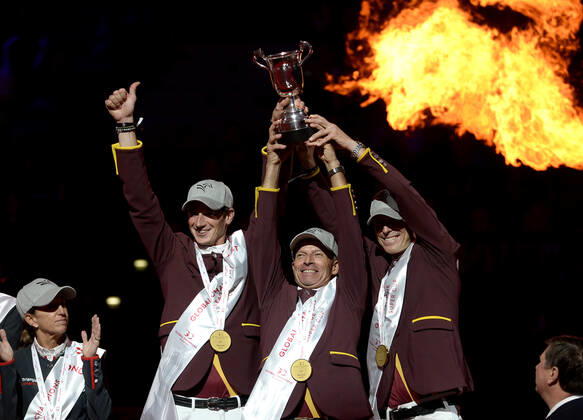 Bilder des Jahres 2019, Sport 11 November L-R showjumpers Daniel Deusser, Pius Schwizer and Peder Fredricson from Shangai Swans winning team pose with the trophy during the Prague PlayOffs show jumping, Global Champions series, on November 24, 2019. (CTKxPhoto KaterinaxSulova) CTKPhotoP201911240605001  suk8 k