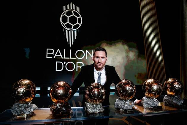 (191203) -- BEIJING, Dec. 3, 2019 (Xinhua) -- The Men s 2019 Ballon d Or winner Barcelona forward Lionel Messi poses with his six Ballon d Or trophies he won in his career so far during the ceremony at the Theatre du Chatelet in Paris, France, Dec. 2, 2019. (Photo by Aurelien Morissard Xinhua) XINHUA PHOTOS OF THE DAY 