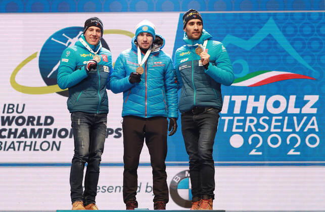 BIATHLON - IBU World Championships Antholz 2020 ANTHOLZ,ITALY,15.FEB.20 - BIATHLON - IBU World Championships 2020, 10km sprint men. Image shows Quentin Fillon Maillet (FRA), Alexander Loginov (RUS) and Martin Fourcade (FRA). Keywords: medal. GEPAxpictures xAndreasxPranter