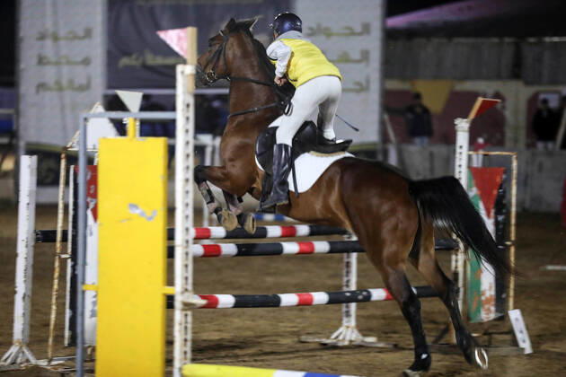 February 27, 2020, Gaza City, Gaza Strip, Palestinian Territory: A Palestinian horse rider on his horse jumps over a barrier during the first championship in jump barriers for the year 2020, on February 27, 2020 Middle East News - February 27, 2020 - ZUMAap3_ 97337390st Copyright: xMahmoudxAjjourx