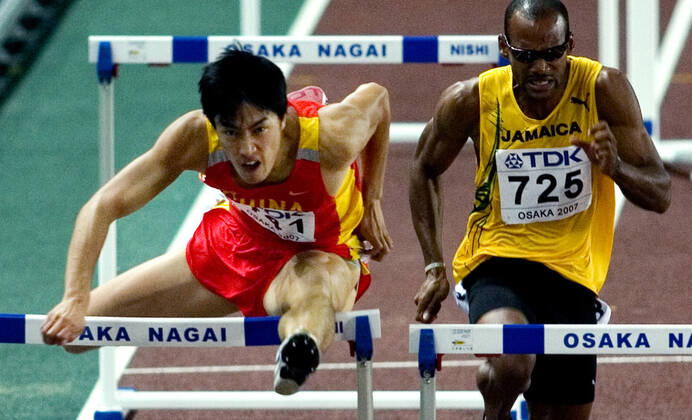 070831 Athletics, World Athletics Championships: Gold medalist Xiang Liu of China during 110 m hurdles at The World Athletics Championships on August 31, 2007 in Osaka, Japan. BILDBYRAN Copyright: EMILxMALMBORG BB070831EM059