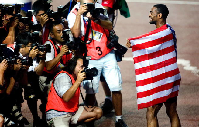 070826 Athletics, World Athletics Championships: Gold medalist Tyson Gay of USA celebrate and pose for photographers after 100 m at The World Athletics Championships on August 26, 2007 in Osaka, Japan. BILDBYRAN Copyright: EMILxMALMBORG BB070826EM017