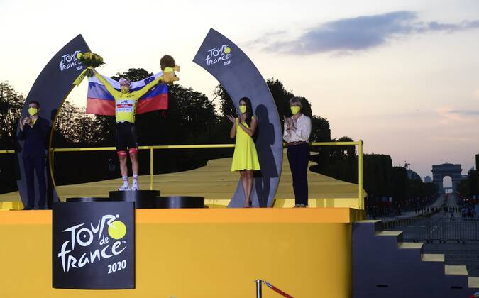 PARIS, FRANCE - SEPTEMBER 20 : POGACAR Tadej (SLO) of UAE TEAM EMIRATES pictured with the yellow jersey during the podium ceremony during stage 21 of the 107th edition of the 2020 Tour de France cycling race, a stage of 122 kms with start in Mantes-la-Jolie and finish at the Avenue des Champs Elysees in Paris on September 20, 2020 in Paris, France, 20 09 2020 CYCLISME : Tour de France - Etape 21 - Mantes la Jolie a Paris Champs Elysees - 20 09 2020 PhotoNews Panoramic 