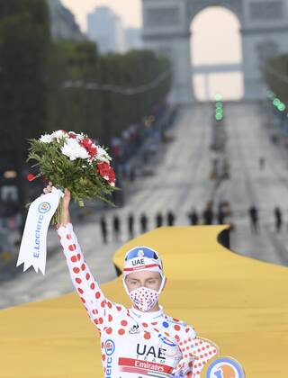 PARIS, FRANCE - SEPTEMBER 20 : POGACAR Tadej (SLO) of UAE TEAM EMIRATES pictured with the polka dot jersey during the podium ceremony during stage 21 of the 107th edition of the 2020 Tour de France cycling race, a stage of 122 kms with start in Mantes-la-Jolie and finish at the Avenue des Champs Elysees in Paris on September 20, 2020 in Paris, France, 20 09 2020 CYCLISME : Tour de France - Etape 21 - Mantes la Jolie a Paris Champs Elysees - 20 09 2020 PhotoNews Panoramic 