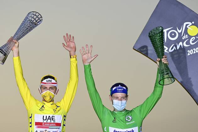 PARIS, FRANCE - SEPTEMBER 20 : POGACAR Tadej (SLO) of UAE TEAM EMIRATES & BENNETT Sam of Deceuninck - Quick Step pictured during the podium ceremony during stage 21 of the 107th edition of the 2020 Tour de France cycling race, a stage of 122 kms with start in Mantes-la-Jolie and finish at the Avenue des Champs Elysees in Paris on September 20, 2020 in Paris, France, 20 09 2020 CYCLISME : Tour de France - Etape 21 - Mantes la Jolie a Paris Champs Elysees - 20 09 2020 PhotoNews Panoramic 