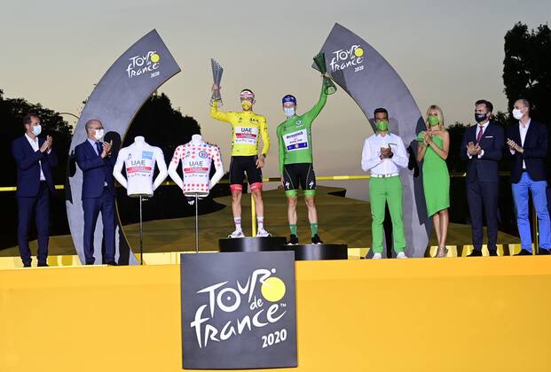 PARIS, FRANCE - SEPTEMBER 20 : POGACAR Tadej (SLO) of UAE TEAM EMIRATES & BENNETT Sam of Deceuninck - Quick Step pictured during the podium ceremony during stage 21 of the 107th edition of the 2020 Tour de France cycling race, a stage of 122 kms with start in Mantes-la-Jolie and finish at the Avenue des Champs Elysees in Paris on September 20, 2020 in Paris, France, 20 09 2020 CYCLISME : Tour de France - Etape 21 - Mantes la Jolie a Paris Champs Elysees - 20 09 2020 PhotoNews Panoramic 