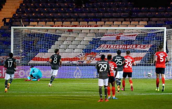 Juan Mata of Manchester United, ManU (8) scores a goal from penalty spot 1-0 during the Carabao Cup match between Luton Town and Manchester United behind closed doors at Kenilworth Road, Luton, England on 22 September 2020. Copyright: xDavidxHornx PMI-3617-0054