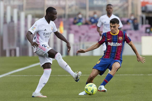 October 24, 2020, Barcelona, Spain: Ferland Mendy of Real Madrid in action with Pedri of FC Barcelona, Barca during the Liga match between FC Barcelona and Real Madrid at Camp Nou on October, 24 2020 in Barcelona, Spain. Barcelona Spain - ZUMAd159 20201024_zia_d159_022 Copyright: xDavidxRamirezx