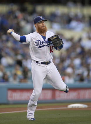 October 27, 2020, Los Angeles, California, USA: Justin Turner 10 of the Los Angeles Dodgers pulled during World Series game 6 after positive coronavirus test. FILE PHOTO: Justin Turner 10 of the Los Angeles Dodgers throws to first base during their MLB, Baseball Herren, USA season game with the San Diego Padres on Thursday August 1, 2019 at Dodger Stadium in Los Angeles, California. Dodgers defeat Padres, 8-2. JAVIER ROJAS PI Los Angeles USA - ZUMAp124 20201027_zaa_p124_004 Copyright: xJavierxRojasx
