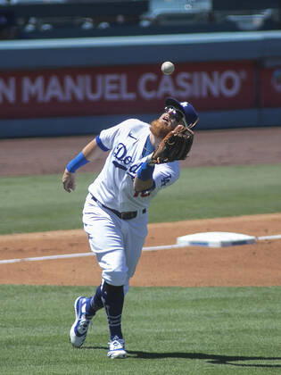 October 27, 2020, Los Angeles, California, USA: Justin Turner 10 of the Los Angeles Dodgers pulled during World Series game 6 after positive coronavirus test. FILE PHOTO: Justin Turner 10 of the Los Angeles Dodgers makes an out during their game against the San Francisco Giants on Sunday August 9, 2020 at Dodger Stadium in Los Angeles, California. Dodgers defeat Giants, 6-2. JAVIER ROJAS PI Los Angeles USA - ZUMAp124 20201027_zaa_p124_005 Copyright: xJavierxRojasx
