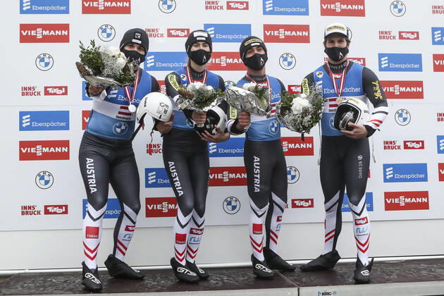 LUGE - FIL WC Innsbruck Igls 2020 INNSBRUCK,AUSTRIA,29.NOV.20 - LUGE - FIL World Cup Igls, artificial track, relay. Image shows the rejoicing of the austrian team. Keywords: trophy. GEPAxpictures xPatrickxSteiner