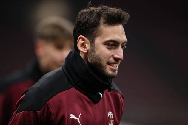 Hakan Calhanoglu of AC Milan during the warm up prior to the Coppa Italia match at Giuseppe Meazza, Milan. Picture date: 12th January 2021. Picture credit should read: Jonathan Moscrop Sportimage EDITORIAL USE ONLY. No use with unauthorised audio, video, data, fixture lists, club league logos or live services. Online in-match use limited to 120 images, no video emulation. No use in betting, games or single club league player publications. SPI-0842-0067