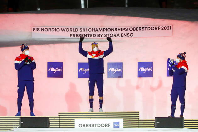 OBERSTDORF, GERMANY - FEBRUARY 27, 2021: Silver medalist Erik Valnes, gold medalist Johannes Hoesflot Klaebo, and bronze medalist Haavard Solaas Taugboel (L-R) of Norway during an award ceremony for the men s classic sprint event at the 2021 FIS Nordic World Ski Championships. Sergei Bobylev TASS  TS0F807E