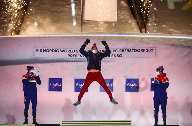 OBERSTDORF, GERMANY - FEBRUARY 28, 2021: Silver medalist Simen Hegstad Krueger of Norway, Gold medalist Alexander Bolshunov of Russia and Bronze medalist Hans Christer Holund (L-R) of Norway pose for a photograph during an award ceremony for the men s 30km skiathlon event at the 2021 FIS Nordic World Ski Championships. Sergei Bobylev TASS  TS0F8217