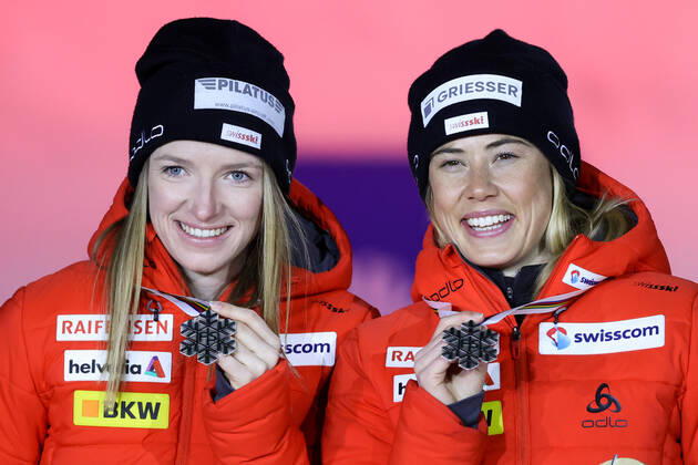 NORDIC SKIING - FIS Nordic World Ski Championships Oberstdorf 2021 OBERSTDORF,GERMANY,28.FEB.21 - NORDIC SKIING, CROSS COUNTRY SKIING - FIS Nordic World Ski Championships, sprint, team event, ladies, award ceremony. Image shows Laurien Van Der Graaff and Nadine Faehndrich (SUI). Keywords: medal. GEPAxpictures xChristianxWalgram