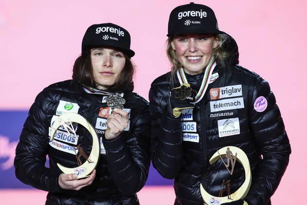 OBERSTDORF, GERMANY - FEBRUARY 28, 2021: Bronze medalists Eva Urevc (L) and Anamarija Lampic of Slovenia pose for a photograph during an award ceremony for the women s team sprint event at the 2021 FIS Nordic World Ski Championships. Sergei Bobylev TASS  TS0F822D