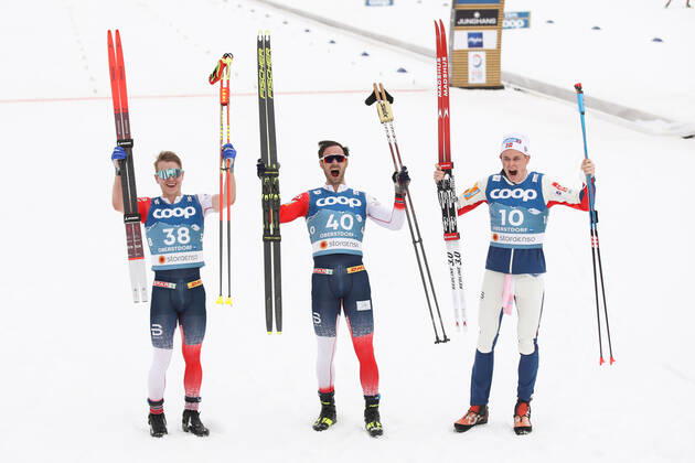 NORDIC SKIING - FIS Nordic World Ski Championships Oberstdorf 2021 OBERSTDORF,GERMANY,03.MAR.21 - NORDIC SKIING, CROSS COUNTRY SKIING - FIS Nordic World Ski Championships, 15km free, men. Image shows the rejoicing of Simen Hegstad Krueger, Hans Christer Holund and Harald Oestberg Amundsen (NOR). GEPAxpictures xChristianxWalgram