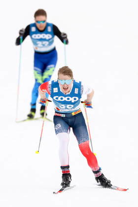 NORDIC SKIING - FIS Nordic World Ski Championships Oberstdorf 2021 OBERSTDORF,GERMANY,03.MAR.21 - NORDIC SKIING, CROSS COUNTRY SKIING - FIS Nordic World Ski Championships, 15km free, men. Image shows Simen Hegstad Krueger (NOR) and Olzhas Klimin (KAZ). GEPAxpictures xChristianxWalgram