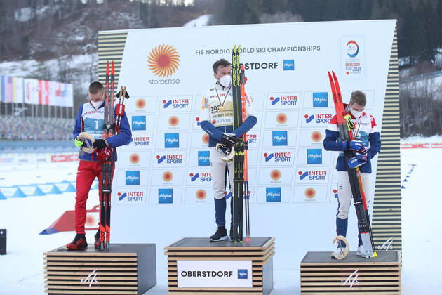 NORDIC SKIING - FIS Nordic World Ski Championships Oberstdorf 2021 OBERSTDORF,GERMANY,07.MAR.21 - NORDIC SKIING, CROSS COUNTRY SKIING - FIS Nordic World Ski Championships, 50km classic, men, award ceremony. Image shows Alexander Bolshunov (RUS), Emil Iversen and Simen Hegstad Krueger (NOR). keywords: medal. GEPAxpictures xChristianxWalgram