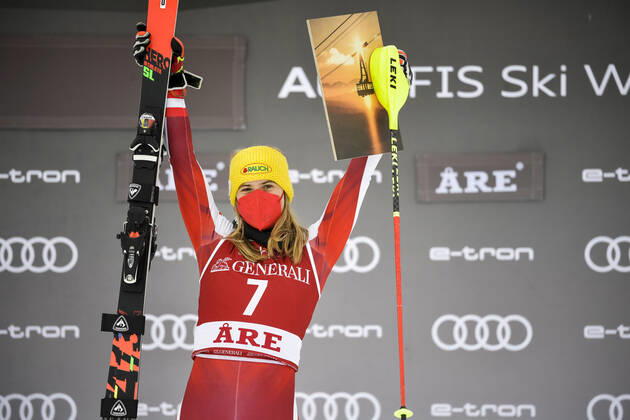 Katharina Liensberger of Austria celebrates on the podium after winning the women s slalom race of the FIS Ski Alpine World Cup in Are, Sweden, on March 13, 2021. ARE SWEDEN ALPINE SKIING x10050x