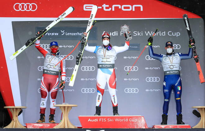 ALPINE SKIING - FIS WC Final Lenzerheide LENZERHEIDE,SWITZERLAND,17.MAR.21- ALPINE SKIING - FIS World Cup Final, award ceremony for the Downhill World Cup, men. Image shows the rejoicing of Matthias Mayer (AUT), Beat Feuz (SUI) and Dominik Paris (ITA). Keywords: crystal globe. GEPAxpictures xMarioxBuehner