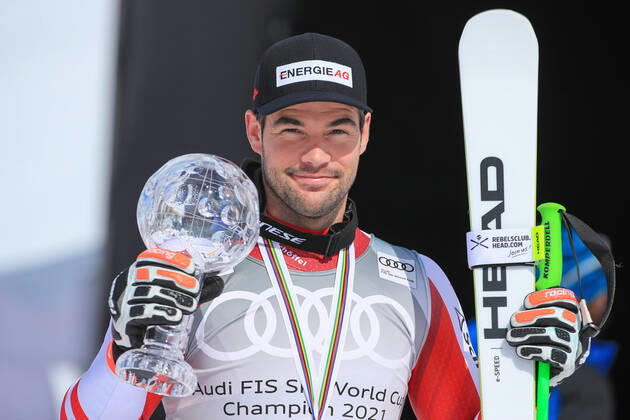 ALPINE SKIING - FIS WC Final Lenzerheide LENZERHEIDE,SWITZERLAND,18.MAR.21- ALPINE SKIING - FIS World Cup Final, award ceremony for the Super G World Cup, men. Image shows the rejoicing of Vincent Kriechmayr (AUT). keywords: crystal globe. GEPAxpictures xMarioxBuehner