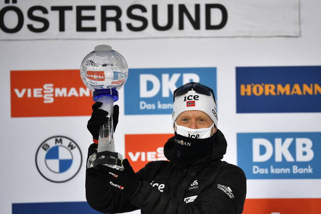 Third placed Johannes Thingnes Boe of Norway celebrates with the trophy after winning the total World Cup, after the Men s 15km Mass Start Competition during the IBU World Cup Biathlon event in Ostersund, Sweden, on March 21, 2021. Photo Anders Wiklund TT code 10040
