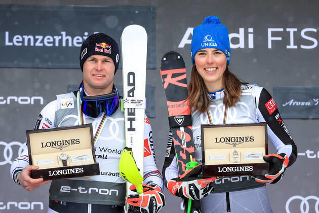 ALPINE SKIING - FIS WC Final Lenzerheide LENZERHEIDE,SWITZERLAND,21.MAR.21- ALPINE SKIING - FIS World Cup Final, men, award ceremony for the overall World Cup. Image shows the rejoicing of Alexis Pinturault (FRA) and Petra Vlhova (SVK). Keywords: medal, crystal globe. GEPAxpictures xMarioxBuehner