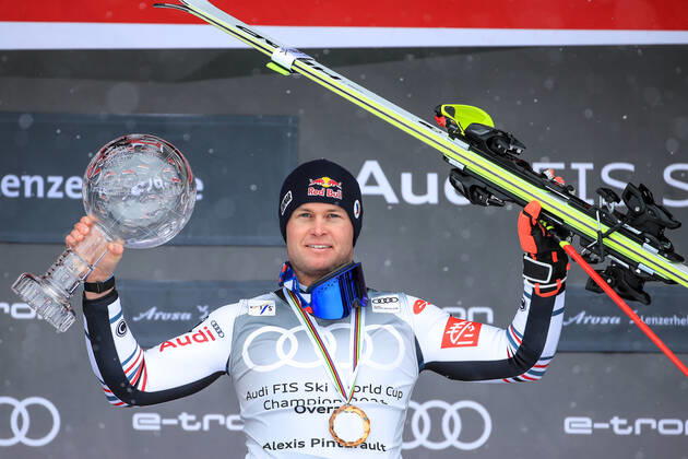 ALPINE SKIING - FIS WC Final Lenzerheide LENZERHEIDE,SWITZERLAND,21.MAR.21- ALPINE SKIING - FIS World Cup Final, men, award ceremony for the overall World Cup. Image shows the rejoicing of Alexis Pinturault (FRA). Keywords: medal, crystal globe. GEPAxpictures xMarioxBuehner