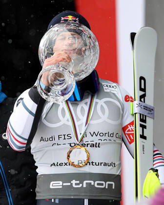 ALPINE SKIING - FIS WC Final Lenzerheide LENZERHEIDE,SWITZERLAND,21.MAR.21- ALPINE SKIING - FIS World Cup Final, men, award ceremony for the overall world cup. Image shows Alexis Pinturault (FRA). Keywords: crystal globe, medal. GEPAxpictures xHaraldxSteiner