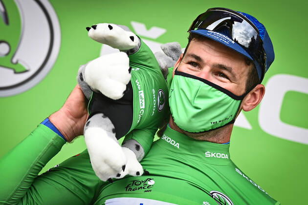 British Mark Cavendish of Deceuninck - Quick-Step celebrates on the podium in the green jersey of leader in the sprint ranking after winning the fourth stage of the 108th edition of the Tour de France cycling race, 150,4km from Redon to Fougeres, France, Tuesday 29 June 2021. This year s Tour de France takes place from 26 June to 18 July 2021. PETExGODING  x3022884x
