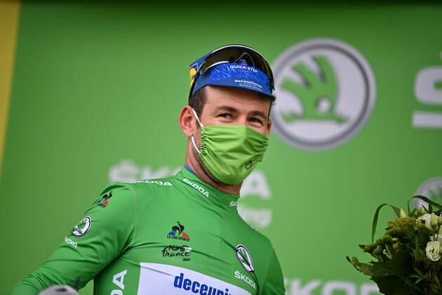 British Mark Cavendish of Deceuninck - Quick-Step celebrates on the podium in the green jersey of leader in the sprint ranking after the fifth stage of the 108th edition of the Tour de France cycling race, a 27,2km individual time trial from Change to Laval Espace Mayenne, France, Wednesday 30 June 2021. This year s Tour de France takes place from 26 June to 18 July 2021. DAVIDxSTOCKMAN  x3023874x