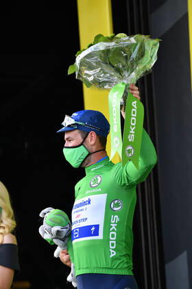 British Mark Cavendish of Deceuninck - Quick-Step celebrates on the podium in the green jersey of leader in the sprint ranking after the sixth stage of the 108th edition of the Tour de France cycling race, 160,6km from Tours to Chateauroux, France, Thursday 01 July 2021. This year s Tour de France takes place from 26 June to 18 July 2021. POOLxDAVIDxSTOCKMAN  x3024935x