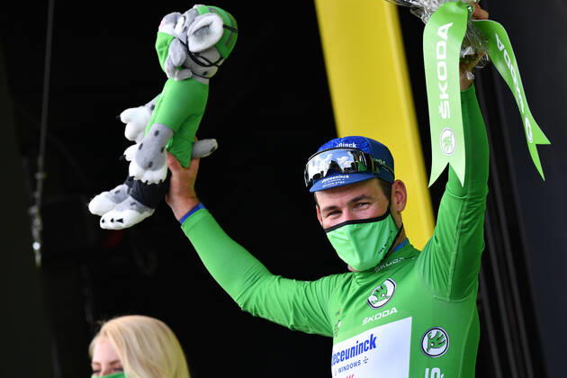 British Mark Cavendish of Deceuninck - Quick-Step celebrates on the podium in the green jersey of leader in the sprint ranking after the sixth stage of the 108th edition of the Tour de France cycling race, 160,6km from Tours to Chateauroux, France, Thursday 01 July 2021. This year s Tour de France takes place from 26 June to 18 July 2021. POOLxDAVIDxSTOCKMAN  x3024942x