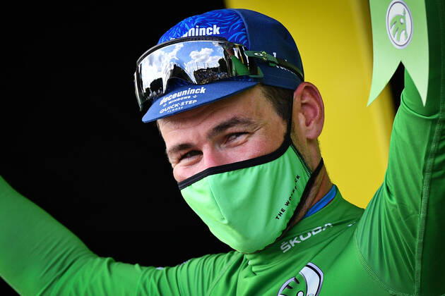 British Mark Cavendish of Deceuninck - Quick-Step celebrates on the podium in the green jersey of leader in the sprint ranking after the sixth stage of the 108th edition of the Tour de France cycling race, 160,6km from Tours to Chateauroux, France, Thursday 01 July 2021. This year s Tour de France takes place from 26 June to 18 July 2021. POOLxDAVIDxSTOCKMAN  x3025110x